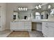 Bathroom features dual vanities with decorative mirrors and tile floors at 5245 Cottage Farm Rd, Johns Creek, GA 30022