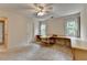 Bedroom with carpet, desk, and natural light from two windows at 5245 Cottage Farm Rd, Johns Creek, GA 30022