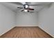 Bedroom featuring vinyl plank floors and a modern ceiling fan at 5245 Cottage Farm Rd, Johns Creek, GA 30022