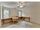 Bedroom with carpet, desk, and natural light from two windows at 5245 Cottage Farm Rd, Johns Creek, GA 30022