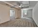 Spacious bedroom features a ceiling fan and a large walk-in closet at 5245 Cottage Farm Rd, Johns Creek, GA 30022