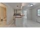 Kitchenette with a sink, bar top, tile floors, and checkered backsplash at 5245 Cottage Farm Rd, Johns Creek, GA 30022