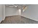 Inviting living room featuring neutral paint, gray carpet, and a staircase at 5245 Cottage Farm Rd, Johns Creek, GA 30022