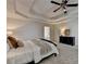 This cozy bedroom offers plush carpet, a ceiling fan, and dark wood furniture at 5245 Cottage Farm Rd, Johns Creek, GA 30022