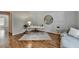 Well-lit office with hardwood floors, area rug and stylish decor at 5245 Cottage Farm Rd, Johns Creek, GA 30022