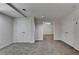 Versatile room with neutral walls, gray carpet, several closets and multiple doorways at 5245 Cottage Farm Rd, Johns Creek, GA 30022