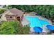 Aerial shot of pool, clubhouse, and lounge area in community at 5245 Cottage Farm Rd, Johns Creek, GA 30022
