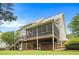 Home featuring deck and patio areas, perfect for outdoor living and entertaining in backyard at 4653 Glory Maple Trce, Powder Springs, GA 30127