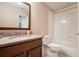 Clean, bright bathroom features granite countertop and shower over tub at 4653 Glory Maple Trce, Powder Springs, GA 30127