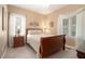 Serene bedroom with neutral walls, plush carpet, soft lighting, and large windows for lots of light at 4653 Glory Maple Trce, Powder Springs, GA 30127