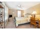 Bedroom with a ceiling fan, desk and chair; serene space with soft lighting at 4653 Glory Maple Trce, Powder Springs, GA 30127