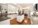 Elegant kitchen with hardwood floors, granite countertops, stainless steel appliances, and white cabinetry at 4653 Glory Maple Trce, Powder Springs, GA 30127