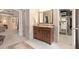 Attractive bathroom features granite countertops and tile flooring plus walk-in closet at 4653 Glory Maple Trce, Powder Springs, GA 30127