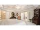 Spacious main bedroom boasts trey ceilings, ensuite and sitting area with furniture at 4653 Glory Maple Trce, Powder Springs, GA 30127
