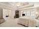 A spacious main bedroom features trey ceilings, sitting area and ensuite at 4653 Glory Maple Trce, Powder Springs, GA 30127