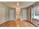 Bedroom with hardwood flooring, neutral wall paint and minimalist decor at 595 Glenforest Rd, Sandy Springs, GA 30328