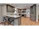 Modern kitchen with white countertops, stainless steel appliances, and hardwood floors at 595 Glenforest Rd, Sandy Springs, GA 30328