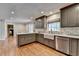 Beautiful eat-in kitchen boasts stainless appliances and hardwood floors at 595 Glenforest Rd, Sandy Springs, GA 30328