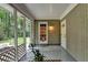 Screened porch featuring views of the backyard at 595 Glenforest Rd, Sandy Springs, GA 30328
