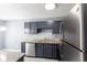 Spacious kitchen features stainless steel appliances and granite countertops at 6726 Gallant Se Ct # 30, Mableton, GA 30126