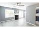 Cozy living area with modern floors, a fireplace, and plenty of natural light at 6726 Gallant Se Ct # 30, Mableton, GA 30126