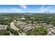An aerial shot shows 908 Catamaran Ct homes near Avalon and Downtown Alpharetta with lush trees at 908 Catamaran Ct, Alpharetta, GA 30005
