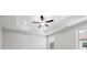 Bedroom featuring a stylish ceiling fan with lights and bright windows, offering comfort and brightness at 908 Catamaran Ct, Alpharetta, GA 30005