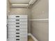 Spacious walk-in closet with custom shelving and built-in drawers for organized storage at 171 Auburn Ne Ave # 210, Atlanta, GA 30303