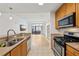 Open-concept kitchen with granite countertops and stainless steel appliances at 171 Auburn Ne Ave # 210, Atlanta, GA 30303