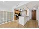 Bright kitchen features stainless steel appliances, granite countertops, and an open design with hardwood floors at 171 Auburn Ne Ave # 210, Atlanta, GA 30303