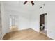 Main bedroom featuring hardwood floors, a ceiling fan, and an ensuite bathroom at 171 Auburn Ne Ave # 210, Atlanta, GA 30303