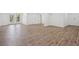 Spacious finished basement with neutral flooring and access to the backyard at 335 Amberidge Nw Trl, Atlanta, GA 30328