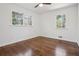 Bright bedroom with hardwood floors, two windows, and ample natural light at 335 Amberidge Nw Trl, Atlanta, GA 30328