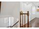 Hallway featuring hardwood floors, stairs, and a glass-paneled front door at 335 Amberidge Nw Trl, Atlanta, GA 30328