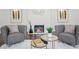 Elegant living room featuring a modern fireplace, stylish seating, and contemporary artwork for a modern aesthetic at 335 Amberidge Nw Trl, Atlanta, GA 30328