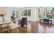 Bright living room with large windows, hardwood floors, and modern furniture at 335 Amberidge Nw Trl, Atlanta, GA 30328