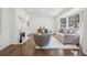 Living room with a modern fireplace and lots of natural light at 335 Amberidge Nw Trl, Atlanta, GA 30328
