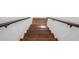 Classic stairway with wooden stairs and white walls at 335 Amberidge Nw Trl, Atlanta, GA 30328