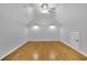 Bonus room with hard wood floors and modern ceiling fan at 11180 West Rd, Roswell, GA 30075