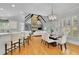 Beautiful open concept kitchen with hardwood floors, and modern appliances at 11180 West Rd, Roswell, GA 30075