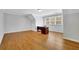 Bright office space featuring hardwood floors and natural light from the window at 11180 West Rd, Roswell, GA 30075