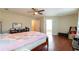 Spacious bedroom featuring hardwood floors, natural light, and neutral wall colors at 2545 Lake Royale Dr, Riverdale, GA 30296