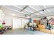 Organized garage with ample storage space, cabinets, and a clean floor at 2545 Lake Royale Dr, Riverdale, GA 30296