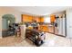Functional kitchen with stainless steel appliances, backsplash, and dining area at 2545 Lake Royale Dr, Riverdale, GA 30296