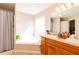 Bright main bathroom features dual vanities, a soaking tub, and a separate shower for relaxation at 2545 Lake Royale Dr, Riverdale, GA 30296