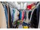 Well-organized walk-in closet with shelving, clothing racks, and storage for maximum space utilization at 2545 Lake Royale Dr, Riverdale, GA 30296