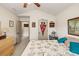 Bright bedroom with vaulted ceilings, a ceiling fan, and a view of an adjacent hallway at 1889 Raegan Way, Lawrenceville, GA 30043