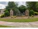 Stone monument for The Reserve at entrance surrounded by landscaping at 1889 Raegan Way, Lawrenceville, GA 30043