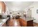 Well-appointed kitchen featuring granite countertops and easy access to the dining area at 1889 Raegan Way, Lawrenceville, GA 30043