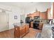 Bright kitchen with granite counters, stainless appliances, and a functional center island at 1889 Raegan Way, Lawrenceville, GA 30043